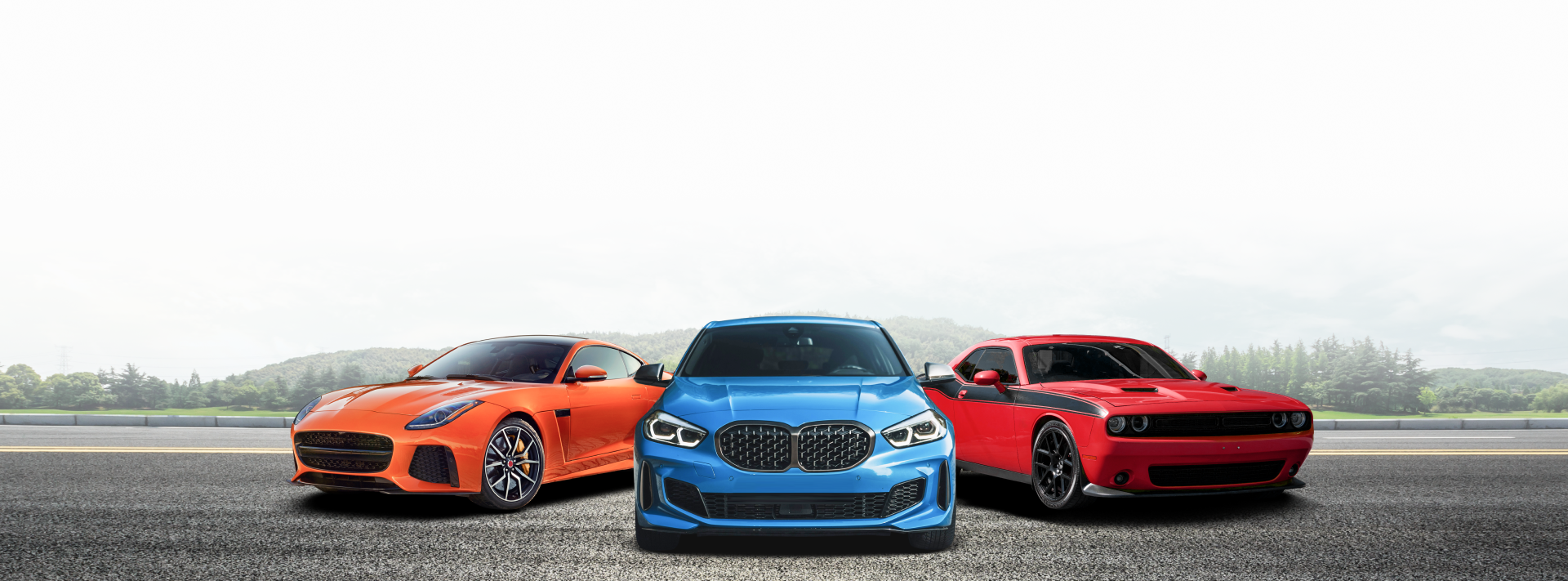 Three cars are parked next to each other on a road.