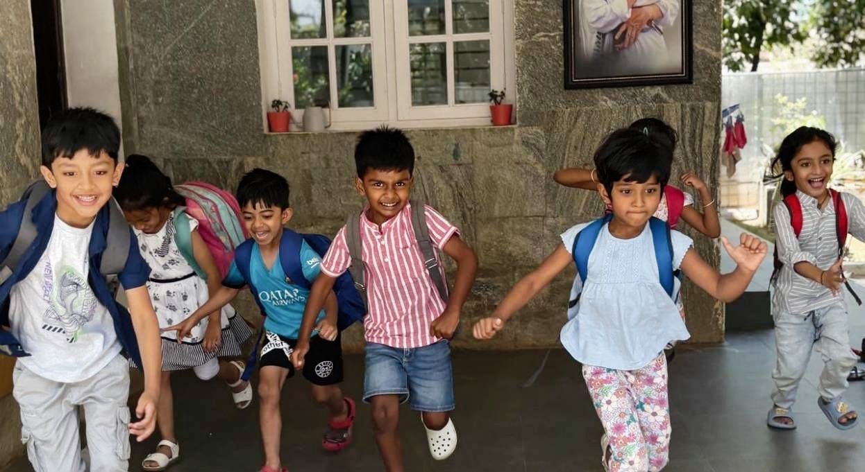 Children are excited and running to attend the Montessori school in Bengaluru