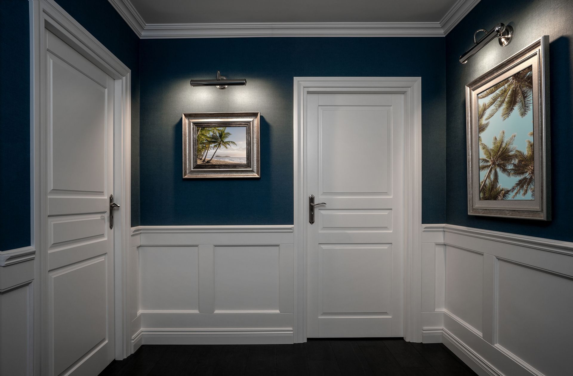 A hallway with two white doors and a painting on the wall.