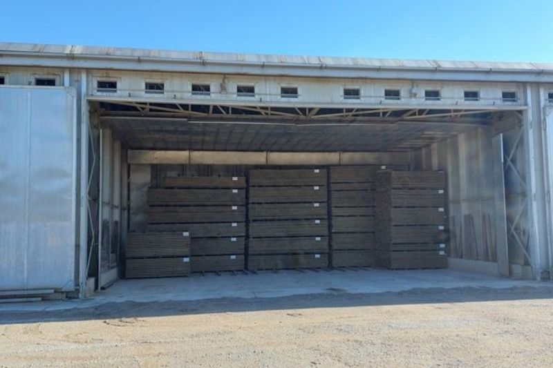 A large building with a lot of boxes inside of it