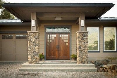 A room with three white doors and a wooden floor.