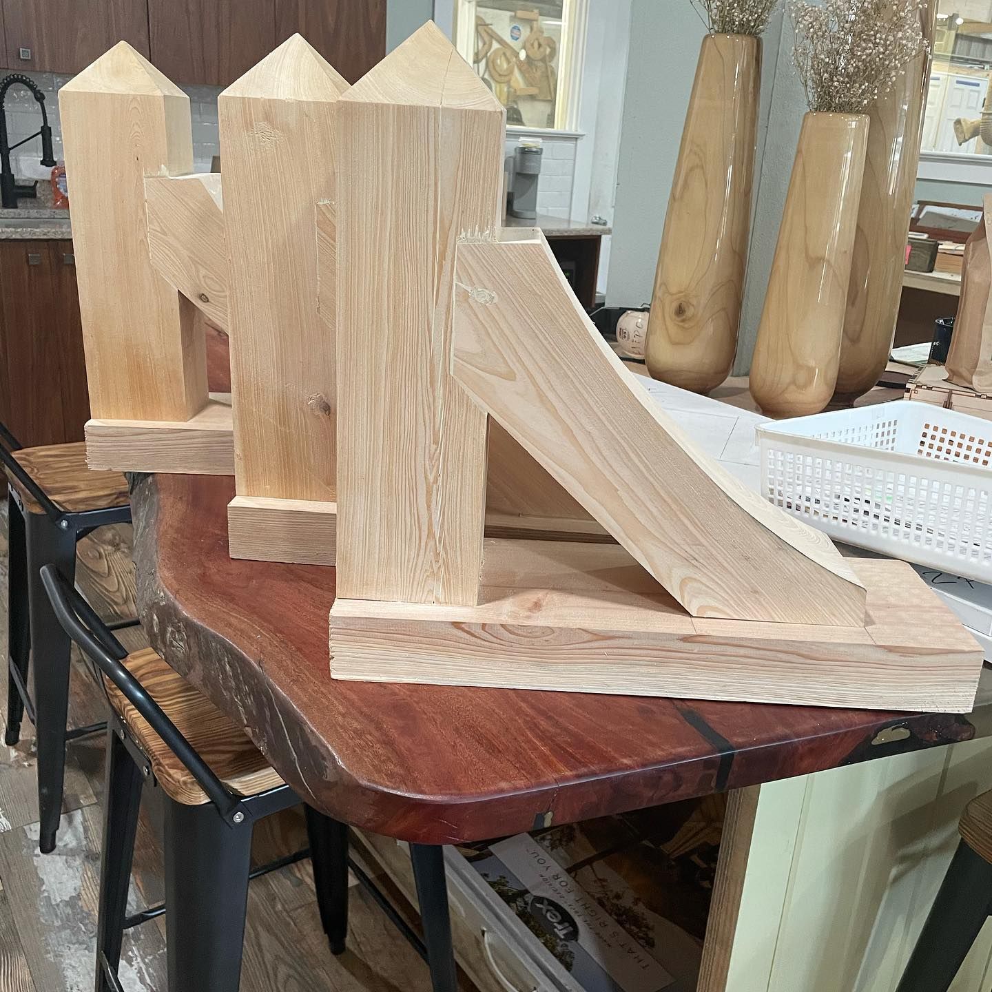 A wooden table with a few pieces of wood on it