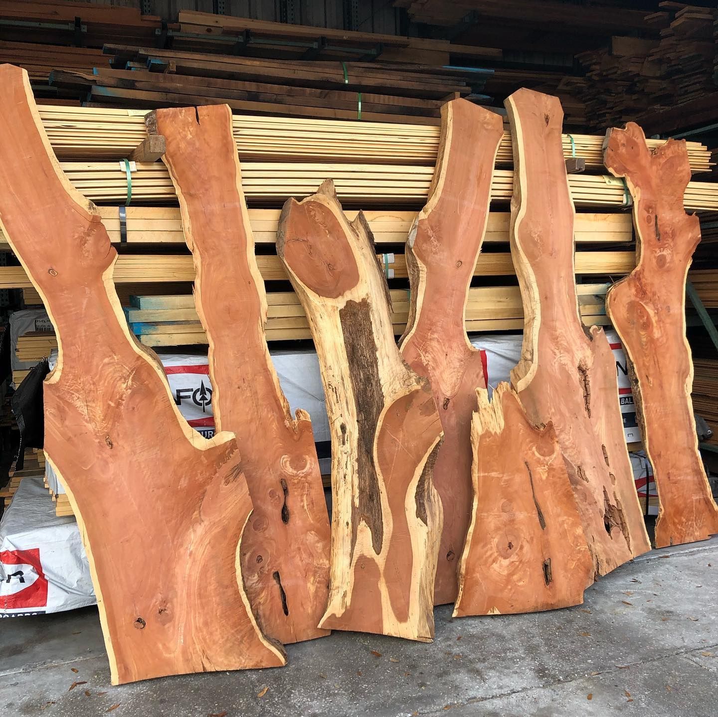 A bunch of pieces of wood are stacked on top of each other