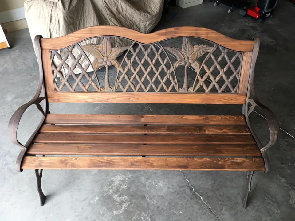 bench repaired with new wood slats