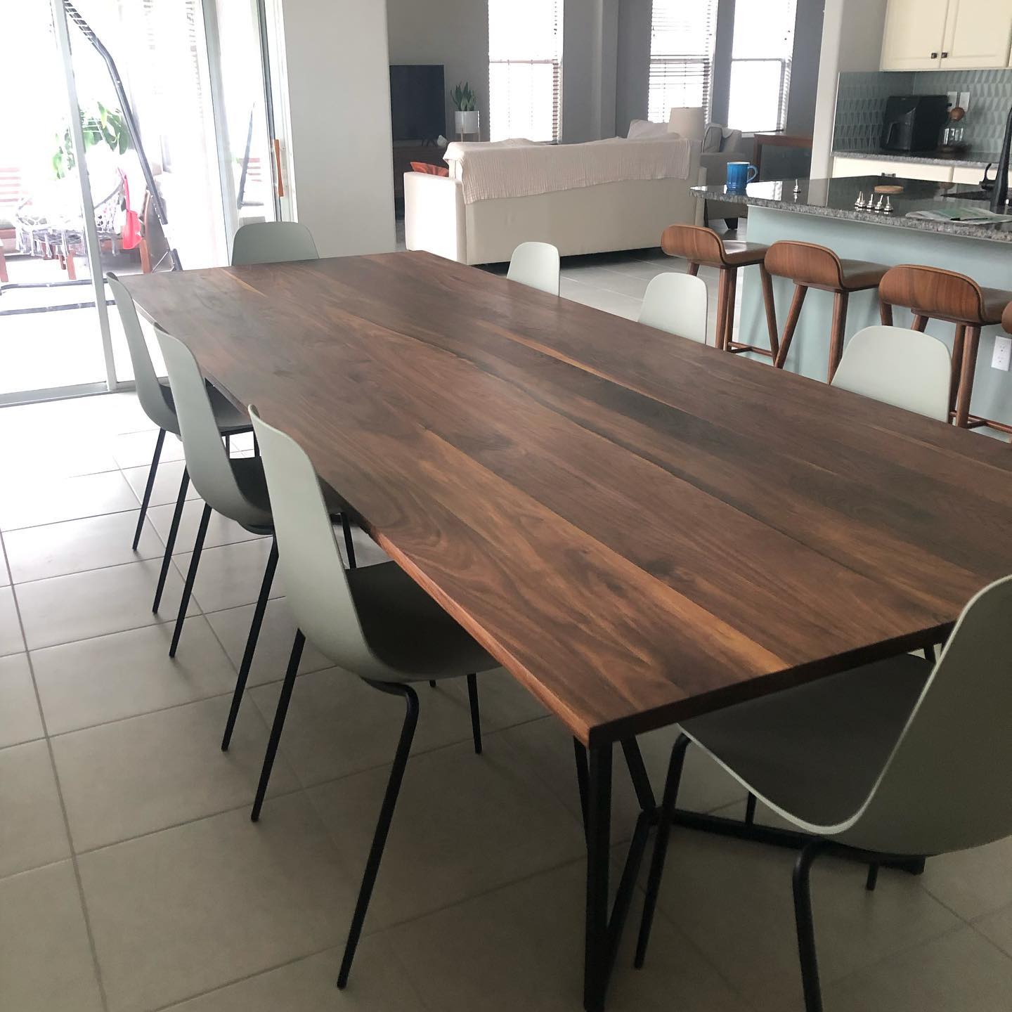 A wooden table and chairs in a living room