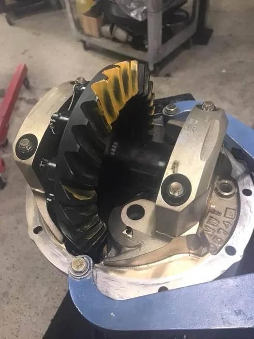 Opened vehicle differential showing gears, housing, and components in a workshop. | Dave Muller Automotive & Trailer