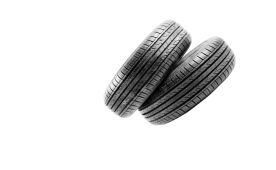 Two car tires stacked on a white background. | Dave Muller Automotive & Trailer
