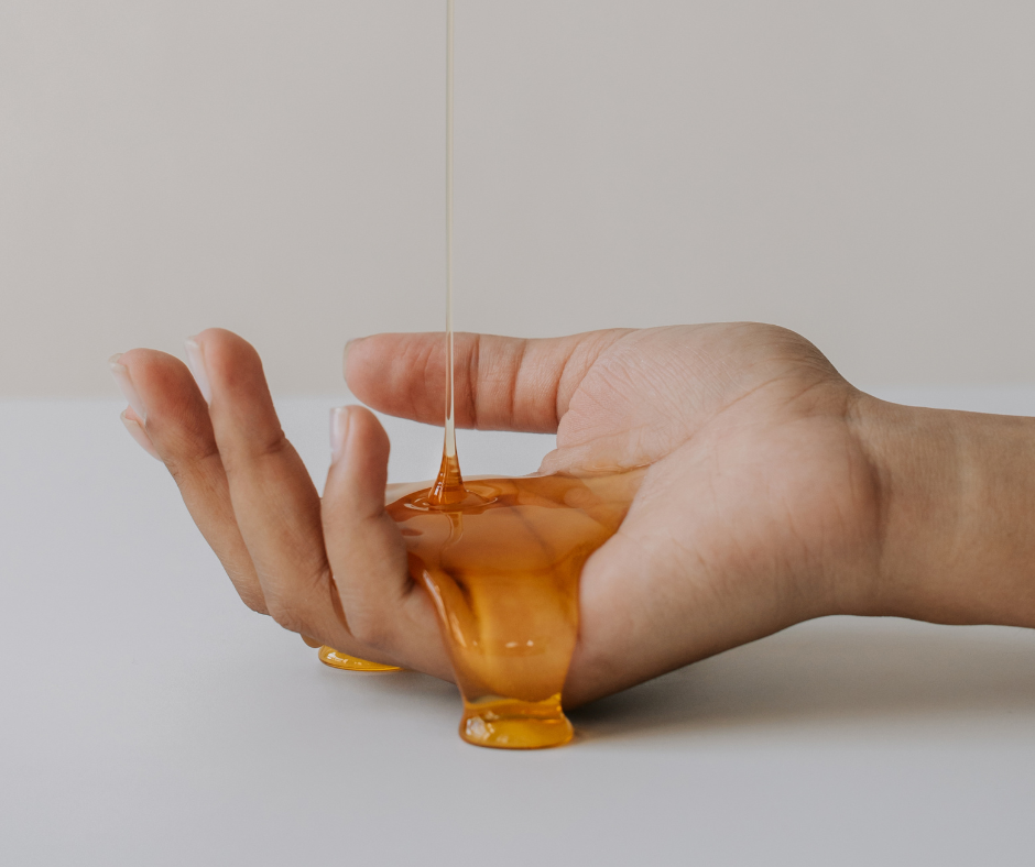 Lake Highlands Honey for Skin Care, honey dripping on a human hand