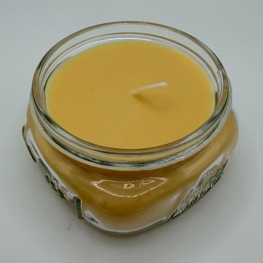 8 oz Honey-scented soy–coconut candle in a mason-style glass jar with smooth creamy golden wax
