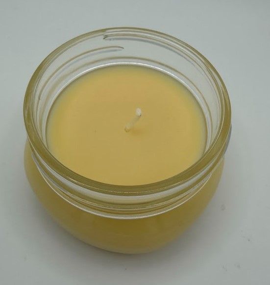 4 oz Honey-scented soy–coconut candle in a mason-style glass jar with smooth creamy golden wax