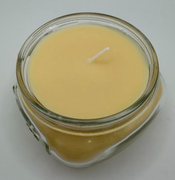 8 oz Honey-scented soy–coconut candle in a mason-style glass jar with smooth creamy golden wax