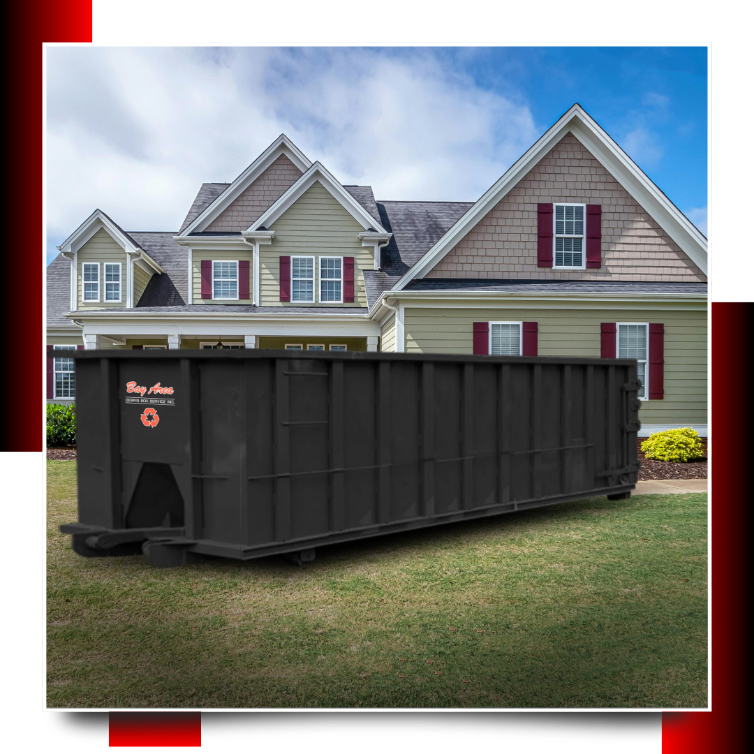 dumspter in front of a house