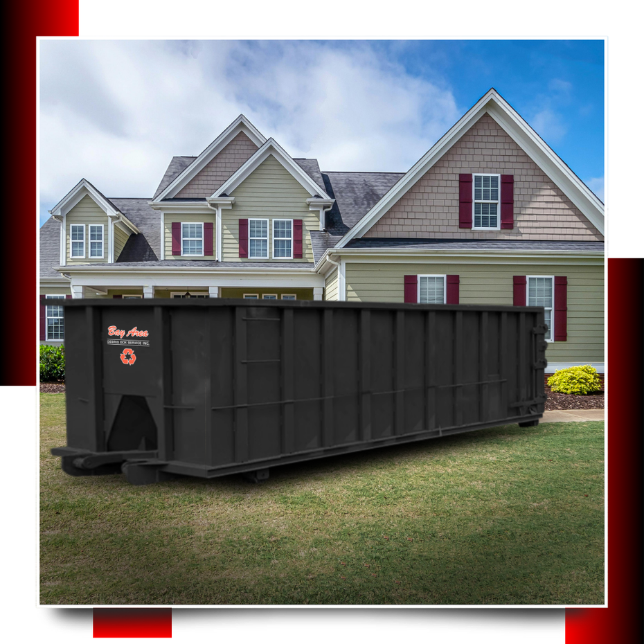 dumspter in front of a house