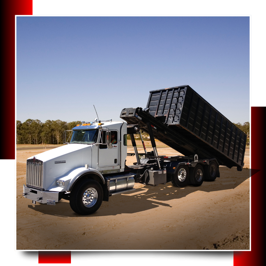dumpster truck in the open field