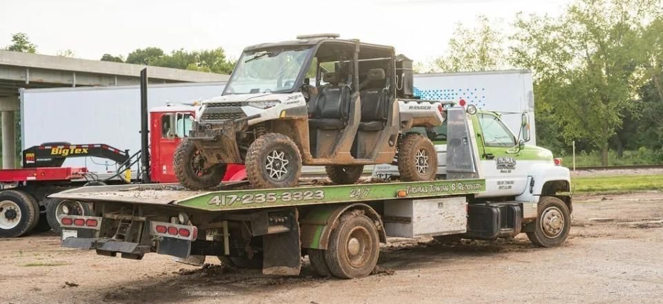 atv on tow truck