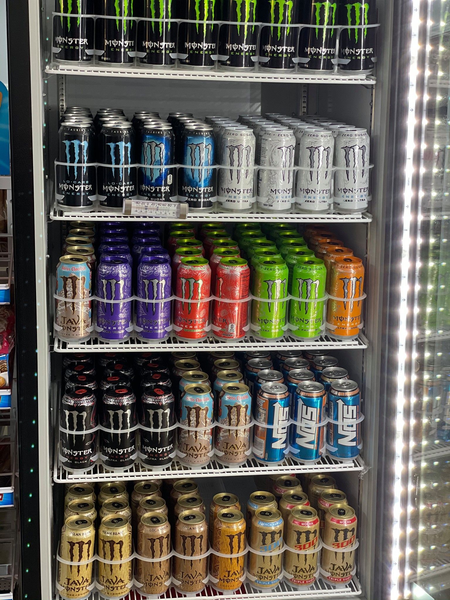 An aerial view of a residential neighborhood with lots of houses and trees.