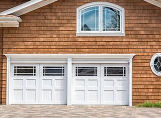 Residential House With White Garage Door - Residential Garage Doors in Amsterdam, NY