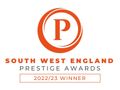 Orange and white logo for South West England Prestige Awards 2022/23 winner; features an orange