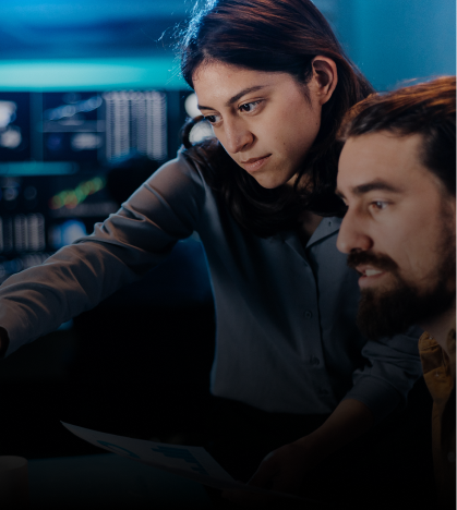 Group of naval personnel and two people in formal attire pose for a photo, holding certificates.