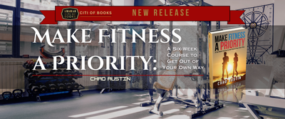 A gym with a sign that says make fitness a priority