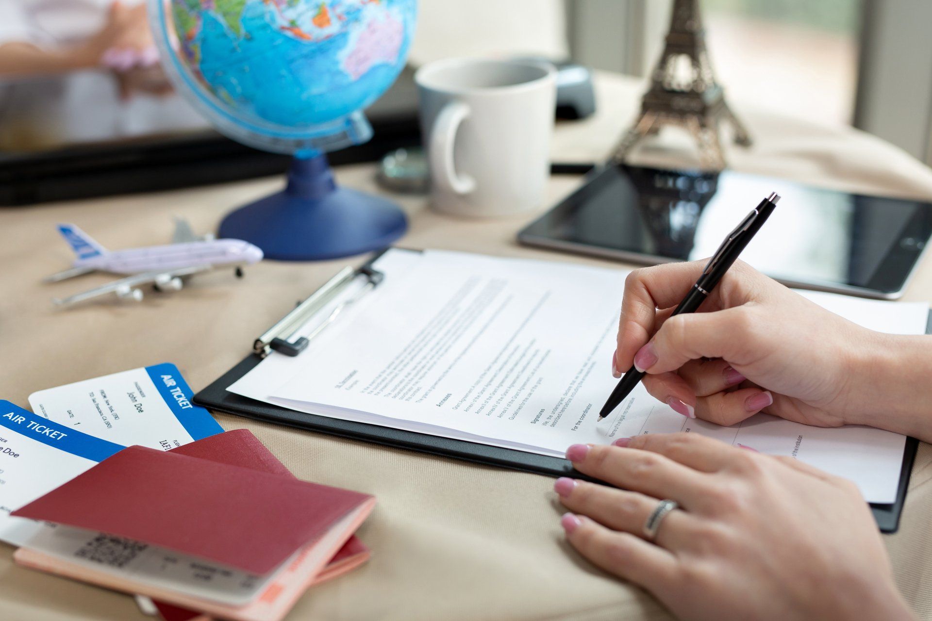 a travel agent working on some documents