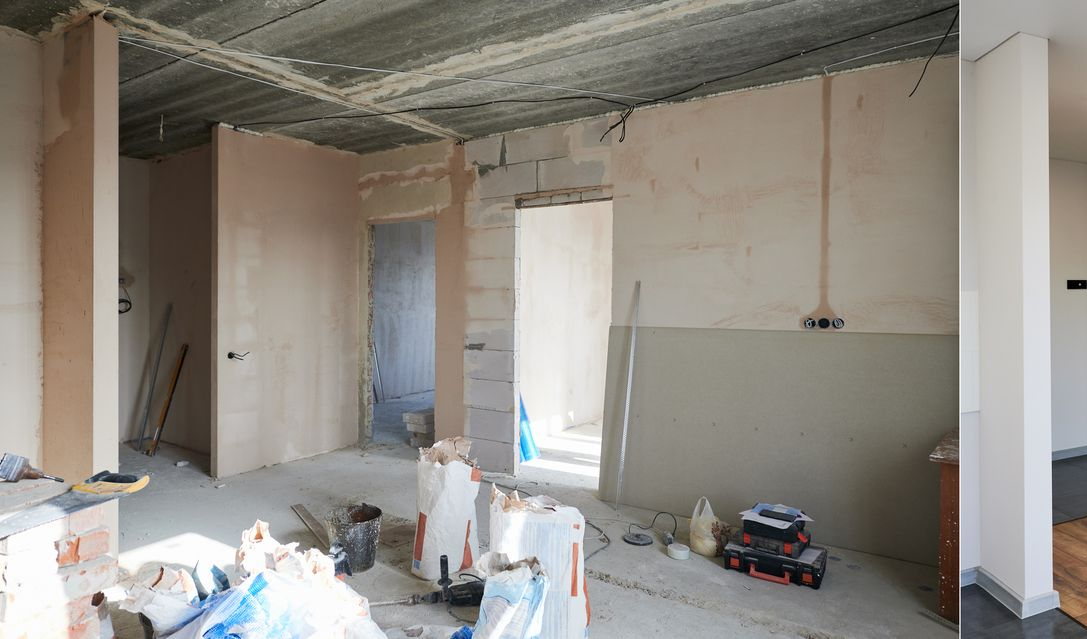 Stanza in fase di ristrutturazione, pareti spoglie, porte aperte, materiali da costruzione sparsi.