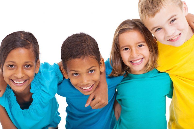 Photo of children smiling - pediatric dentist tuscaloosa al