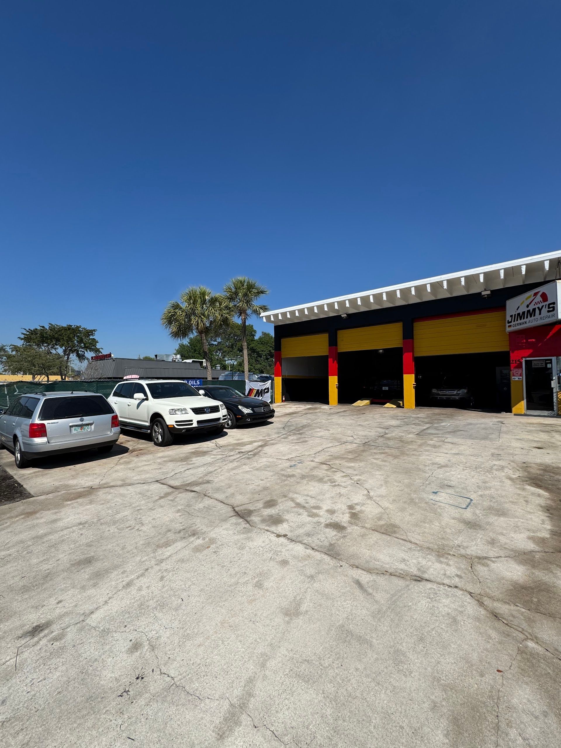 Shop exterior image with a parked car | Jimmy's German Auto Repair