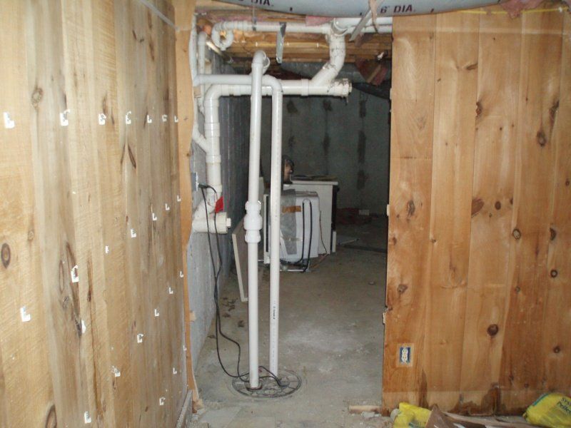 Basement with Pipes — Cape Cod, MA — BelPort Building & Remodeling, LLC