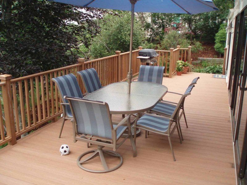 Deck with Table and Chairs — Cape Cod, MA — BelPort Building & Remodeling, LLC