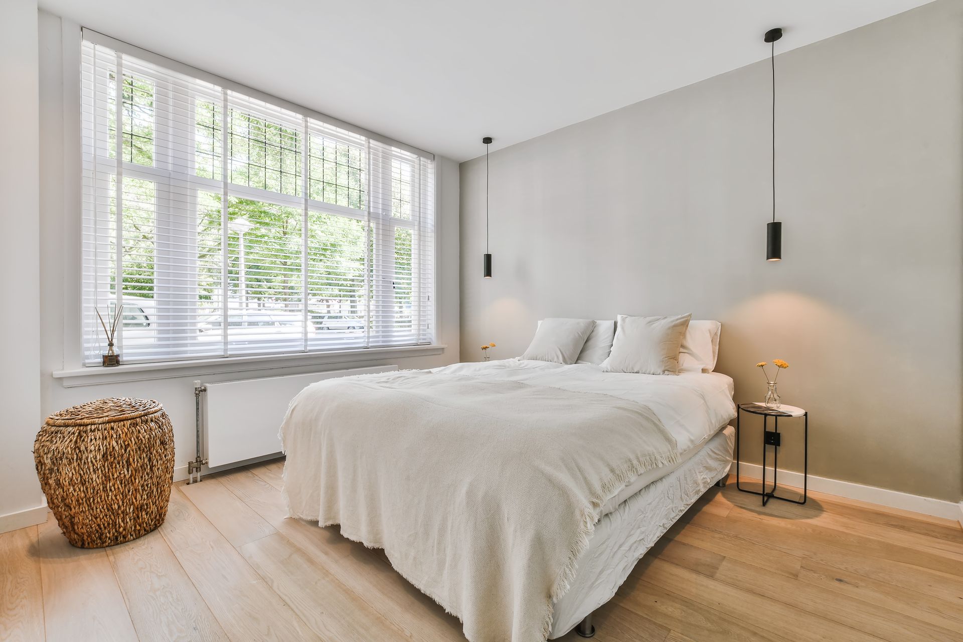 bedroom with greenery outside