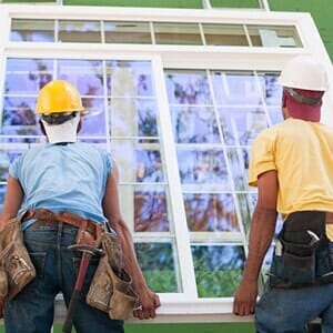 Two Workers Installing Window - Roofing Contractor in Oakland, NJ