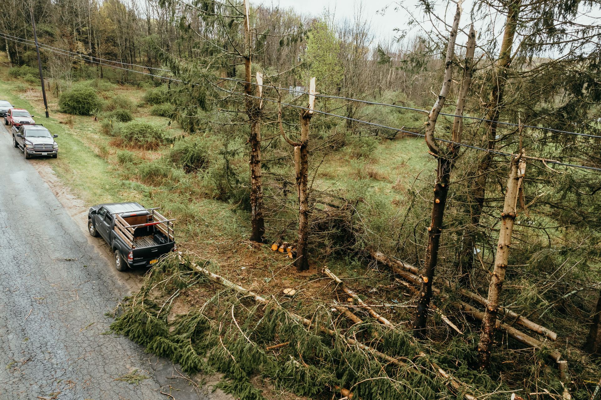 An aerial view of a truck parked on the side of a road.