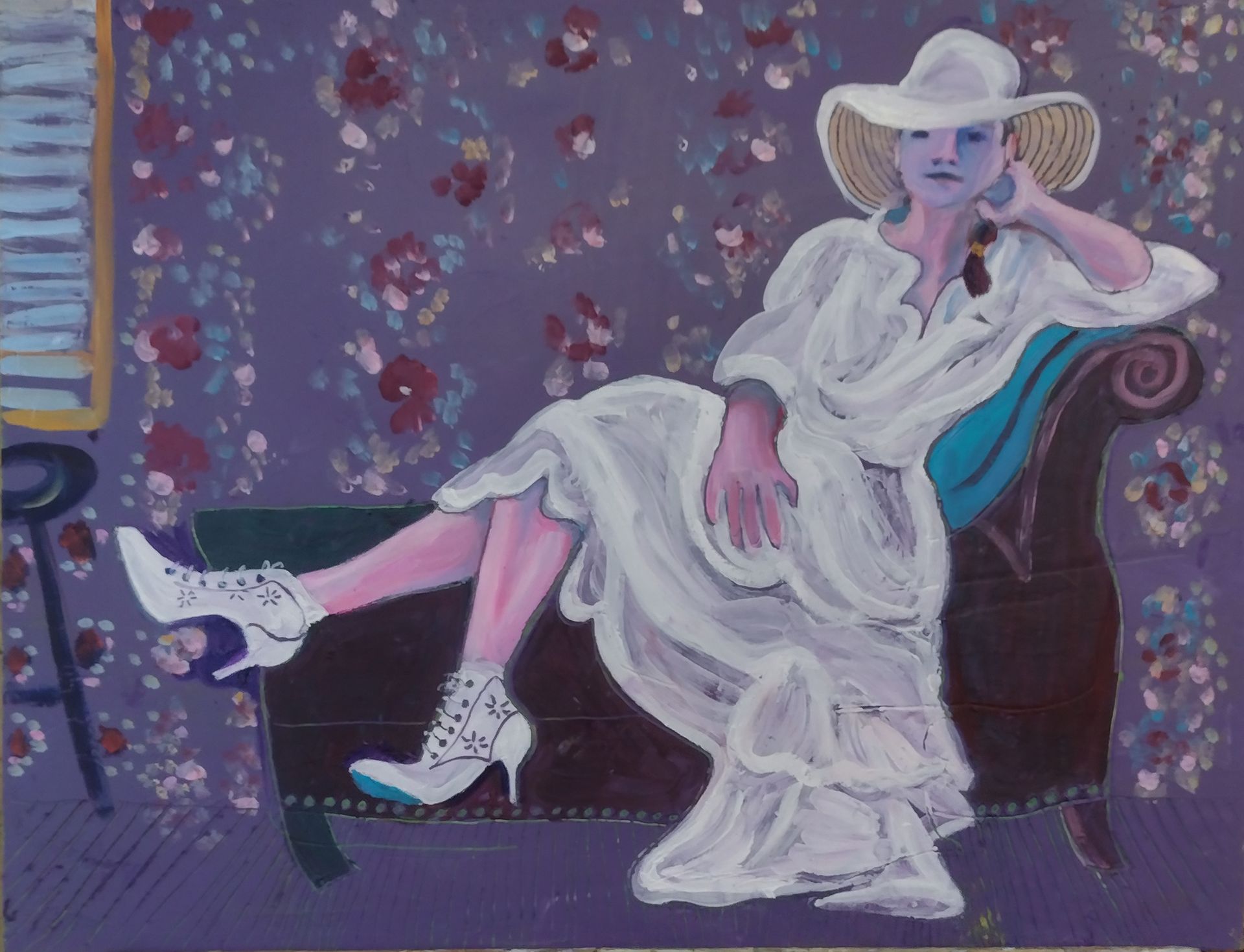 Woman in white dress and hat reclines on a chaise lounge against floral wallpaper.