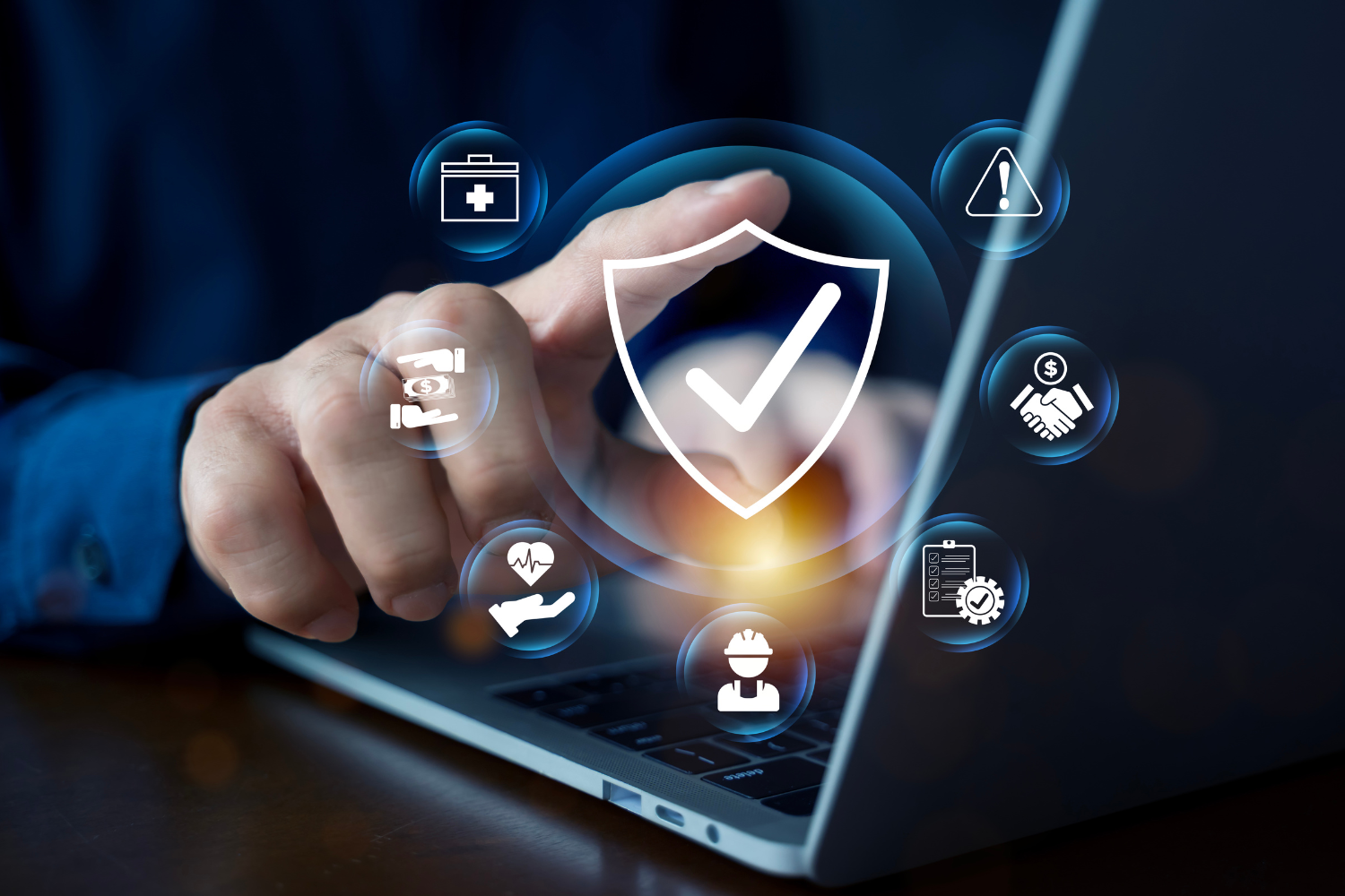 Hand interacting with a virtual shield icon above a laptop, representing data security.