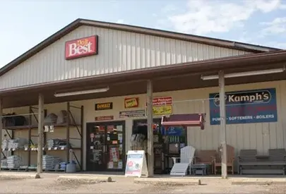 Man Hand Working on A Wooden Table — Massillon, OH — Kamph’s Hardware and Plumbing Services