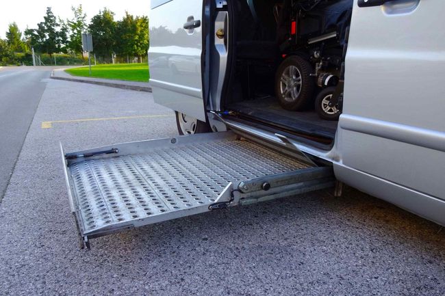Texas Senior Care Transport_Wheelchair vans on a street with an open door