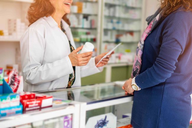 Texas Senior Care Transsport_Woman buying medicine in a pharmacy