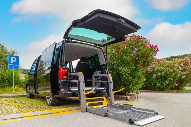 Texas Senior Care Transport_Wheelchair vans with rear door open in a parking space