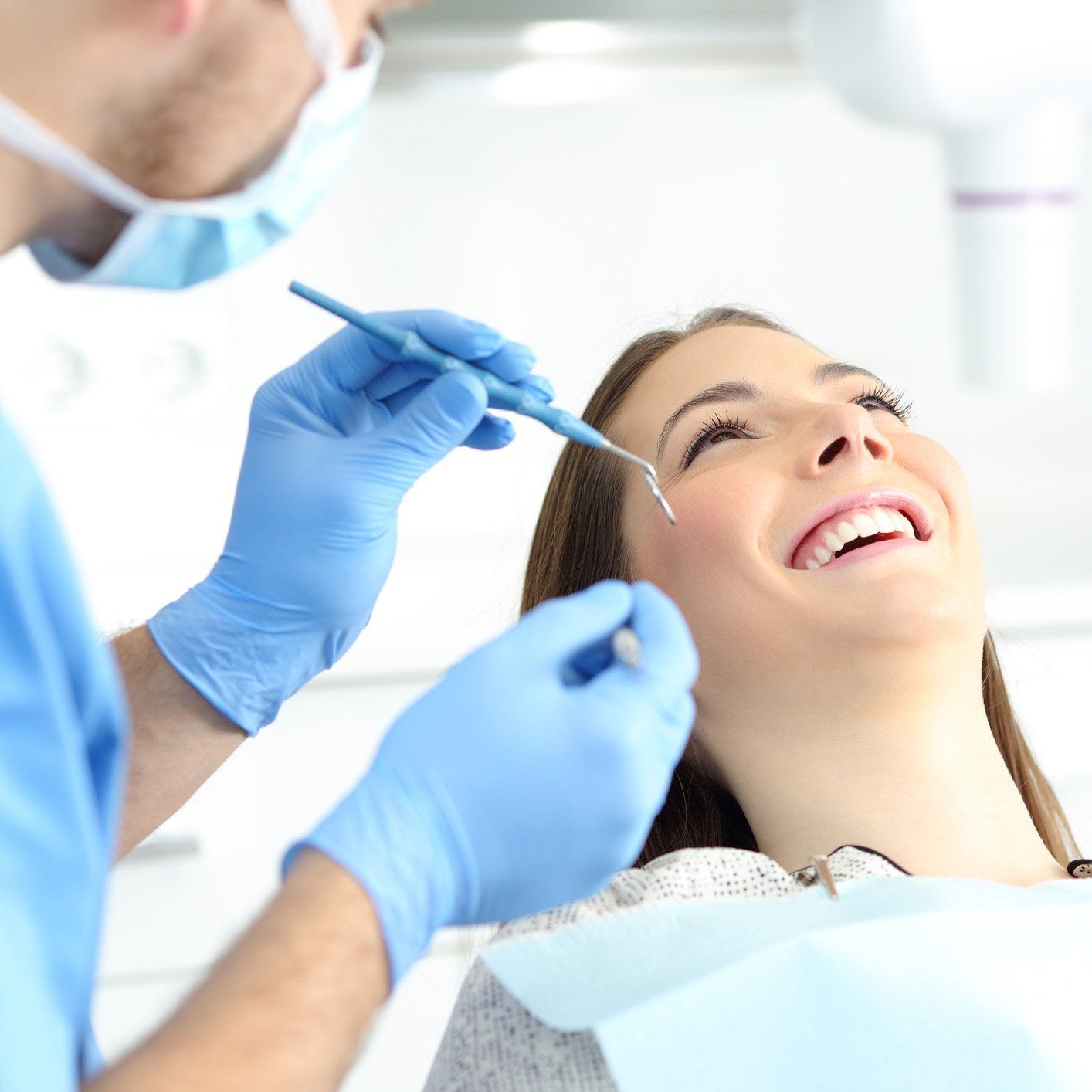 Root Canal — Woman Smiling On Dental Clinic in Akron, Oh