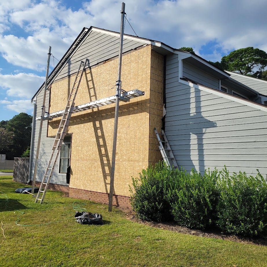 Siding installation in Wilmington NC with new Cedar ship lap siding and fiber cement by Howard Roofing & Construction