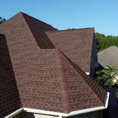 An aerial view of GAG HDZ Hickory architectural shingle roof installation done by Howard Roofing & Construction based in Rocky Point, NC.