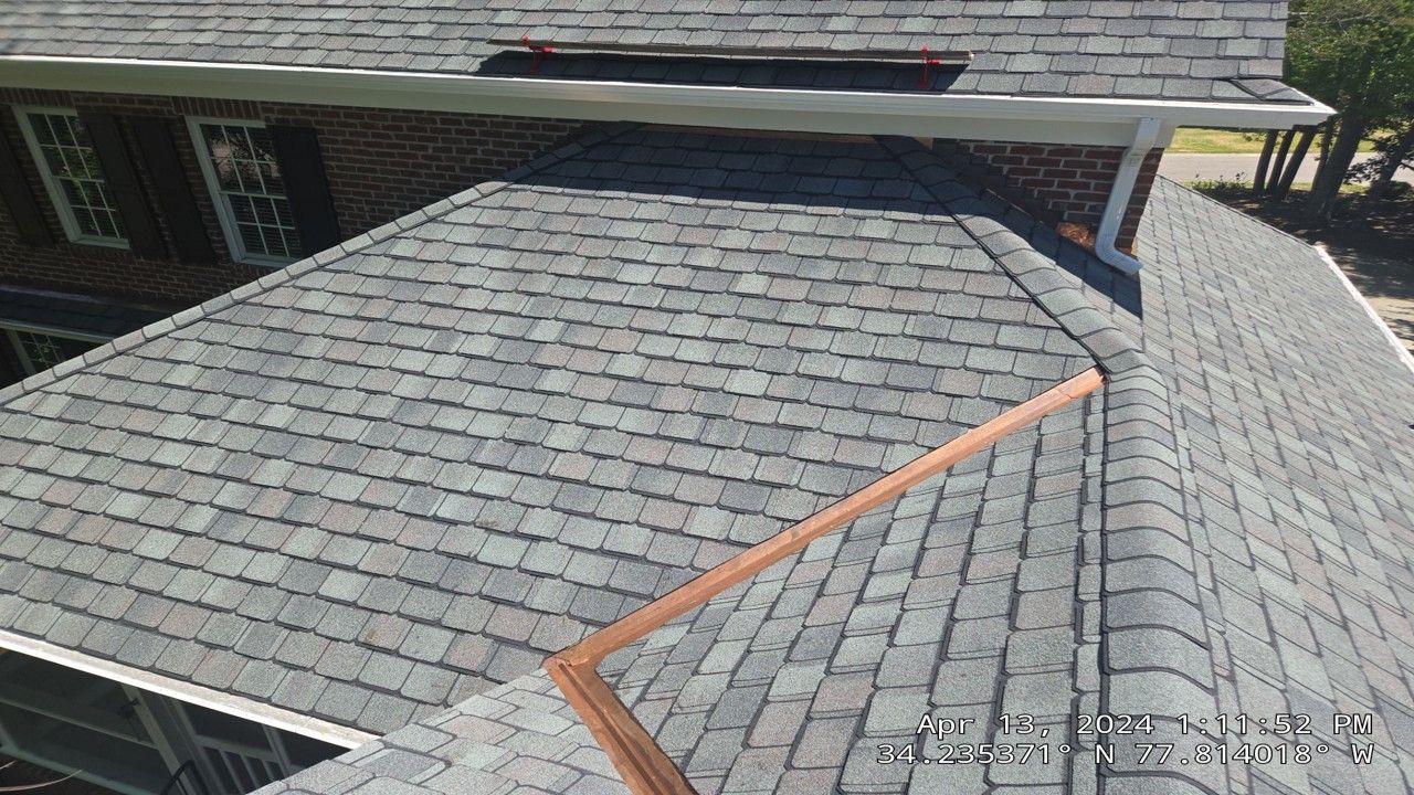 Asphalt designer shingle roofing installation Wilmington NC home exterior