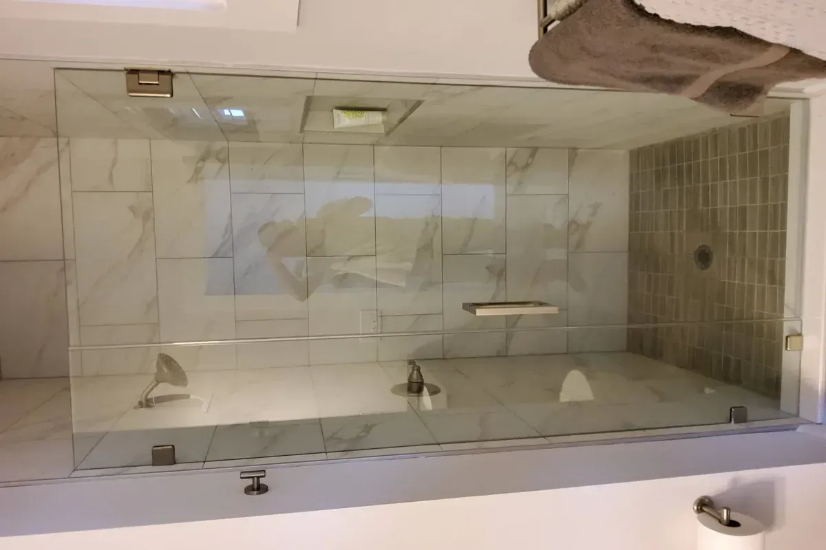 Tile shower with glass doors