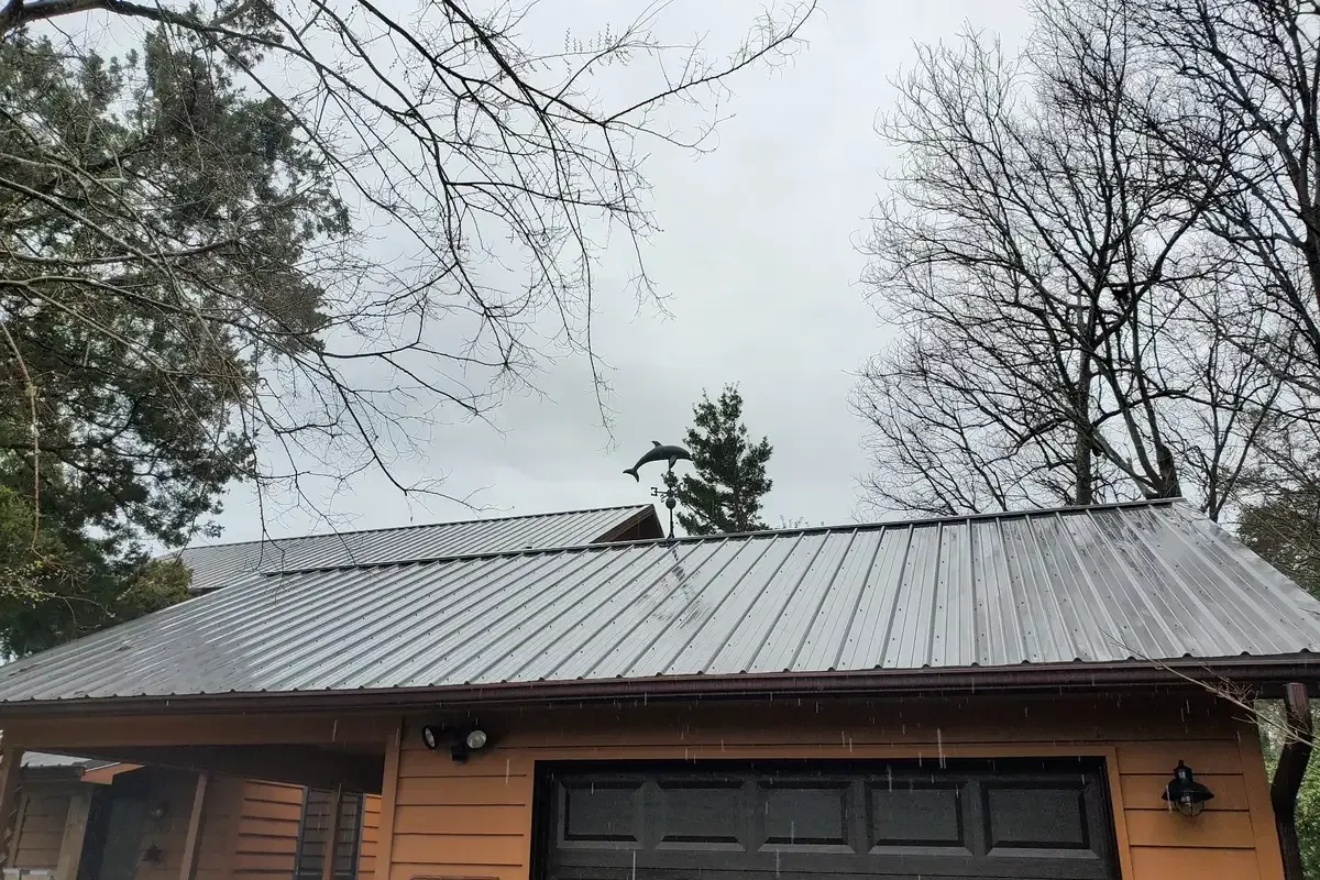  Corrugated screw-down metal roofing system installed in Hampstead NC, showing strong ribbed panels and coastal-ready performance.

