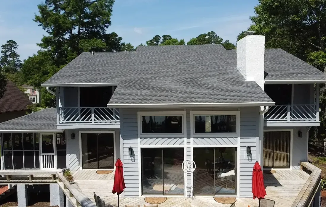 Full roof replacement with all new windows and siding repairs with a complete fresh exterior paint job.