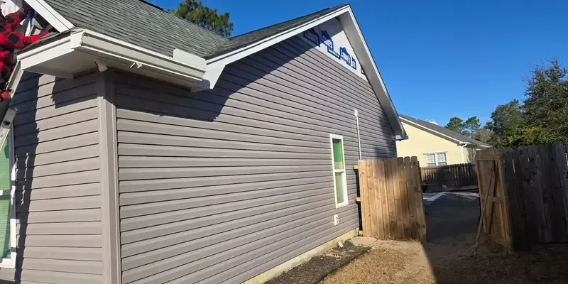 Vinyl siding replacement project in Wilmington NC with modern profile and low-maintenance exterior finish
