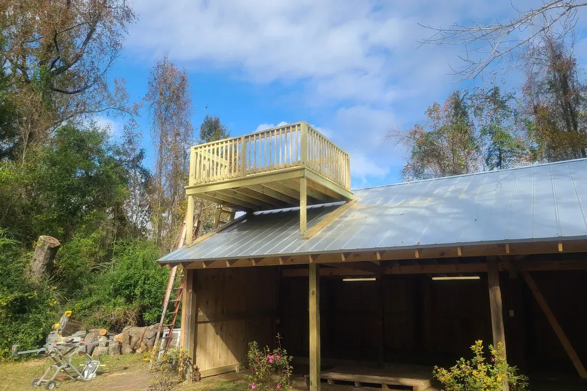  Standing seam metal roof installation in Wilmington NC, showcasing clean panel layout and upgraded flashing for long-term durability.
