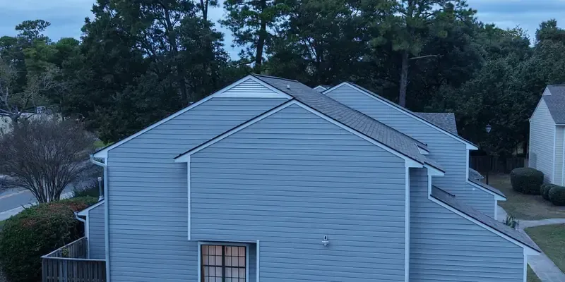 		Completed cedar shiplap siding installation and exterior paint job in Wilmington NC improving curb appeal and weather protection
