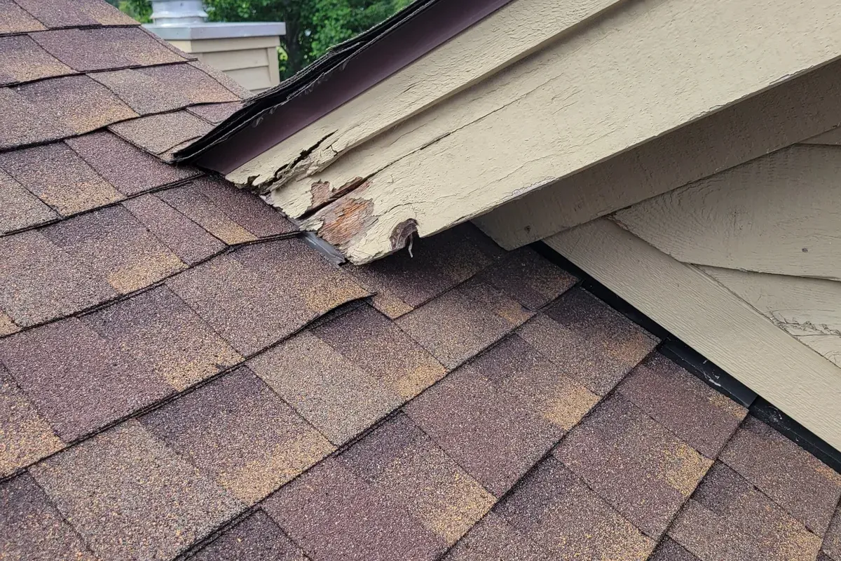 Broken rake trim and improperly installed flashing causing water intrusion on a Wilmington NC roof.
